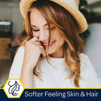 Woman wearing a straw hat with text 'Softer Feeling Skin & Hair' in the corner